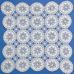 Top view crochet on blue background