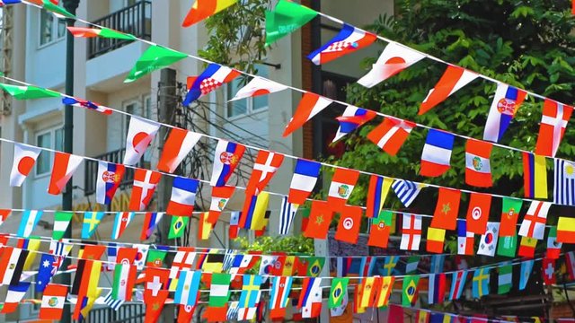 flags of states around the world on the city street