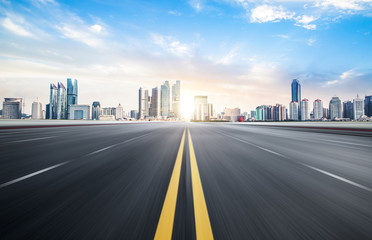 The expressway and the modern city skyline are in Chongqin.g, China