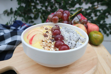 mango yogurt with dragon fruit and grape