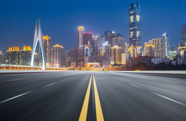 Fototapeta na wymiar The expressway and the modern city skyline are in Chongqin.g, China