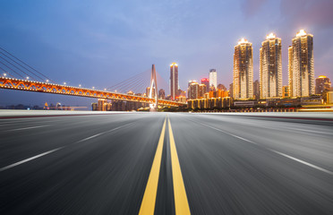 Fototapeta premium The expressway and the modern city skyline are in Chongqin.g, China