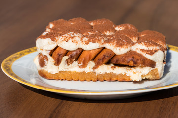 Traditional italian dessert tiramisu on a table