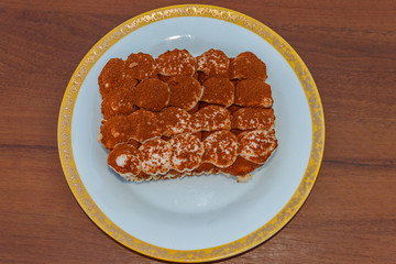 Traditional italian dessert tiramisu on a table