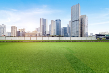 Obraz premium The square with lawn and the modern city skyline are in Chongqing, China.
