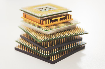 
different computer processors on a white background stacked in a stack
