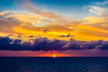 Amazing colors of light in the sky as the sun sets in the Caribbean.