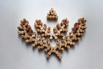 Wine corks wreath abstract composition isolated on white background from a high angle view