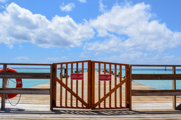 Boardwalk/Pier from a tropical Caribbean beach into the ocean