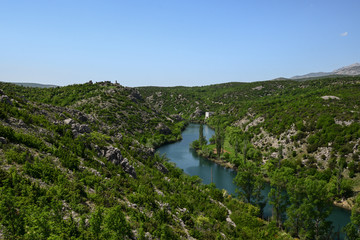 Ruins of the old Venetian and Ottoman fortress Stari Obrovac are positioned high above Canyon of Zrmanja River in northern Dalmatia, Croatia.