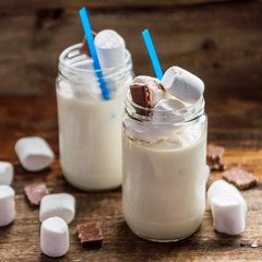 Chocolate Nice cream on wooden background, copy space. Homemade vegan - healthy summer dessert.