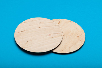 Cork coaster mockup, circle brown wood board.