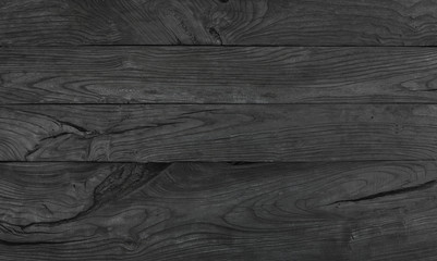 black abstract rough old wooden background of hardwood boards