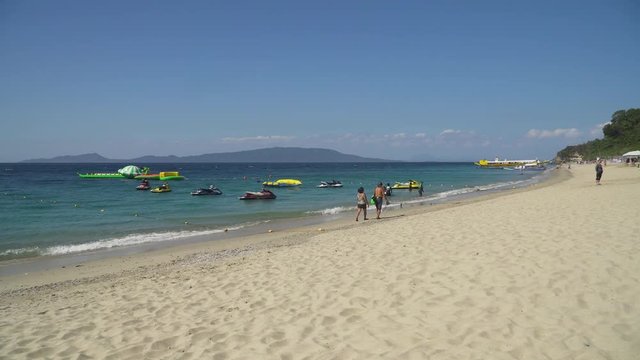 Beautiful tropical beach with white sand. White Beach, Philippines, Mindoro