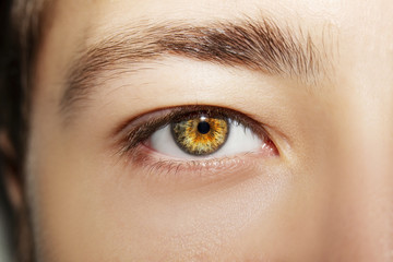 A beautiful insightful look man's eye. Close up shot.