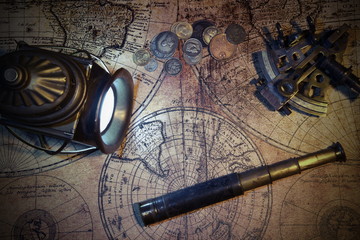 Plakat Ship lantern, compass, old coins and sextants. Travel and marine engraving background.Pirate map. Retro style.