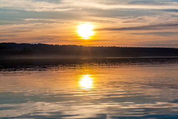 Fototapeta na wymiar charming sunset on Lake Seliger