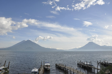 Docks on Lake with Volcanoes on the Horizon