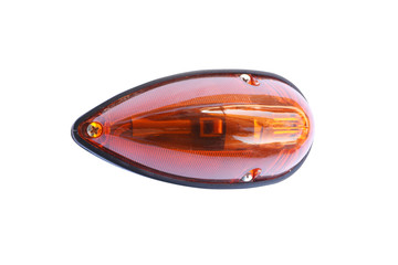 Car turn signal on isolated white background. Auto parts close-up.