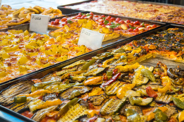 texture of vegetarian pizza on the bench of the city of venice