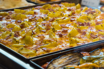 texture of vegetarian pizza on the bench of the city of venice
