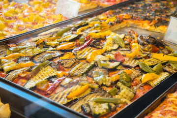 texture of vegetarian pizza on the bench of the city of venice