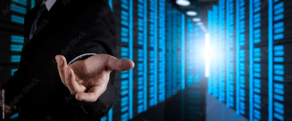 Poster Businessman working with VR wide blank screen computer on server room in background.