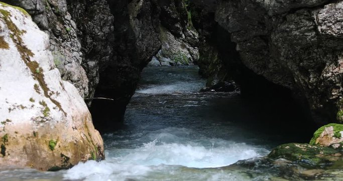 Magic gorge detail with rocky mountain river, Kamnik Bistrica, Slovenia. Dolly slider equipment and slow motion used.