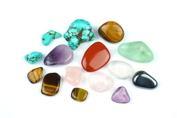 Natural colorful gem stones isolated on white background.
