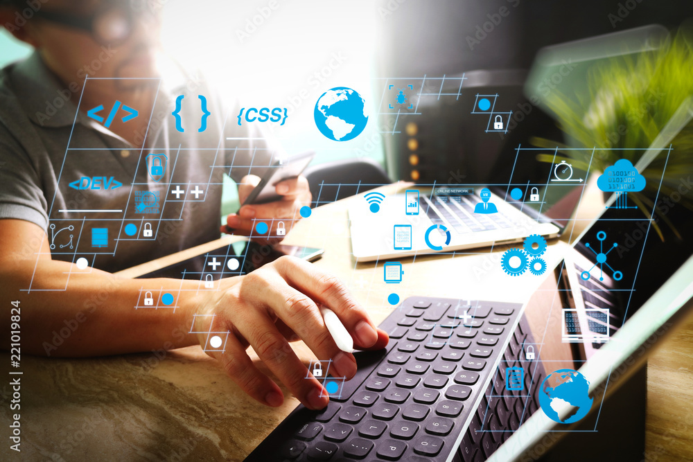 Poster Outsource Developer working on marble Desk Working Laptop Computer Mobile Application Software and digital tablet dock smart keyboard,compact server,sun flare effect