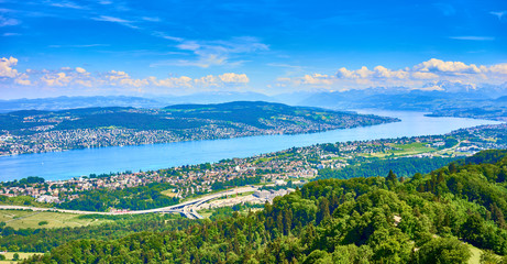 Fototapeta na wymiar Panoramic view over Lake of Zurich in Switzerland / Alps in the background