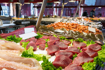 Tuna steaks and other fish meat at Mercato Ittico di Rialto - venetian fish market in Venice, Italy - obrazy, fototapety, plakaty