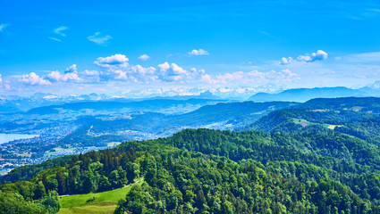 Backlands and woods of Zurich in Switzerland / View over Cantons of "Aargau" and "Zug" with alps in the background