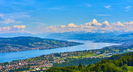 Panoramic view over Lake of Zurich in Switzerland / Alps in the background - obrazy, fototapety, plakaty