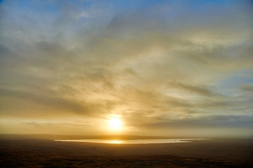 Naklejka na ściany i meble Sunrise over the lake in Iceland