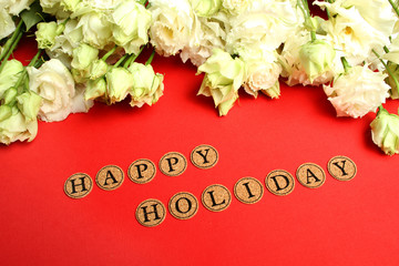 Postcard with white roses and happy Holiday text