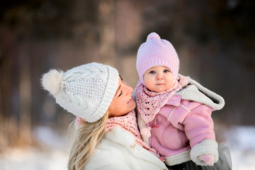 Beautiful Mother and daughter winter portrait  - 221033432