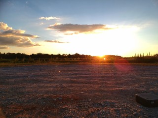 Sunset from a gravel parking lot