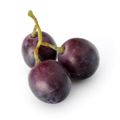 Red grape berry bunch isolated on white background cutout