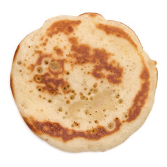 One pancake isolated on white background cutout. Top view.