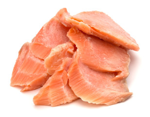 smoked salmon segments isolated on white background cutout. Prepared fish fillet fibres.