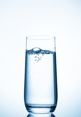 water glass on blue background