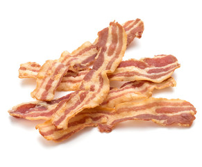 cooked crispy slices of bacon isolated on white background