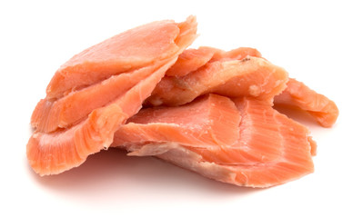 smoked salmon segments isolated on white background cutout. Prepared fish fillet fibres.