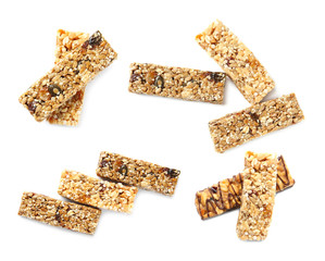 Set with grain cereal bars on white background, top view. Healthy snacks