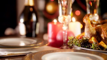 4k video of burning fireplace and served table for Christmas dinner