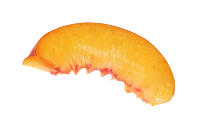 Slice of juicy peach on white background