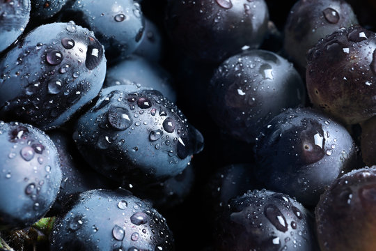 Bunch of fresh ripe juicy grapes as background. Closeup view