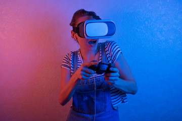 Woman watching with VR with red and blue light