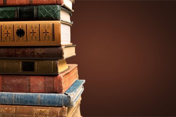 Collection of old books  on background